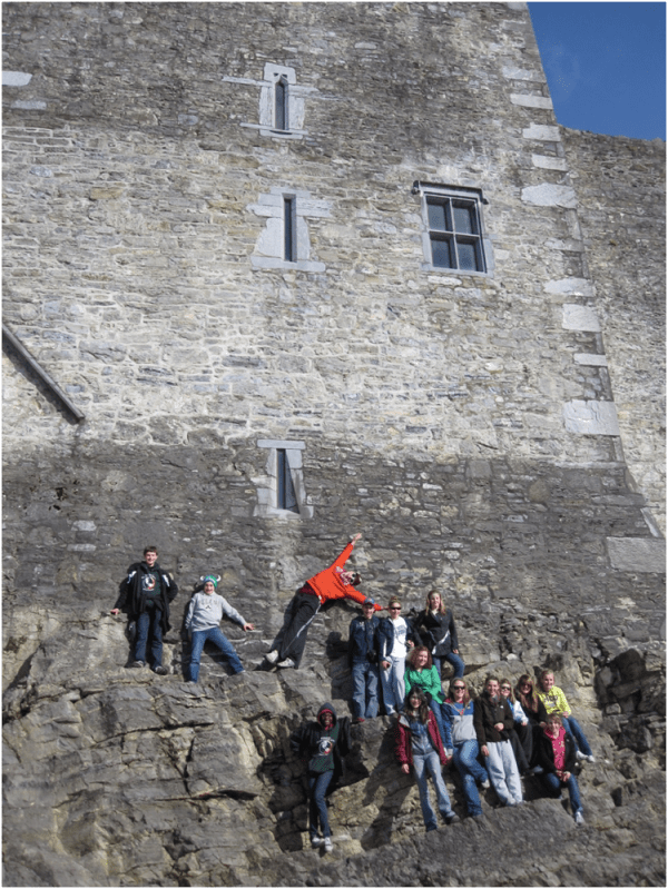 This is one of favorite pictures from Ireland. It pretty much sums up the trip – fun! Where else would you get to climb up the side of a castle and have a photo shoot!?!?  Ross Castle, Killarney, County Kerry, Ireland.
