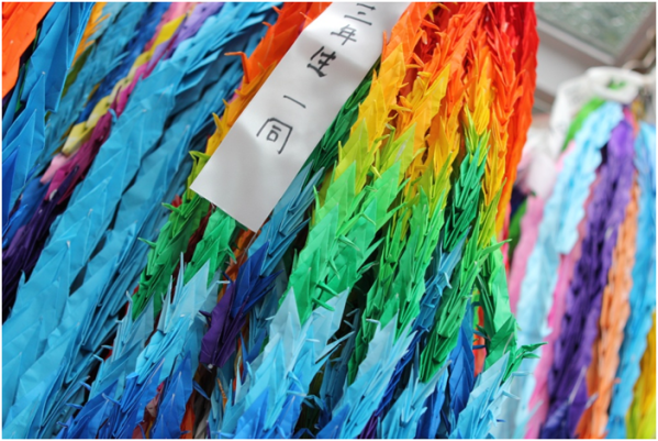 This photo was taken in the city of Hiroshima in Japan. At Peace Memorial Park, you see brightly colored paper cranes  everywhere folded by people all over the world as a wish for peace. Words can’t describe the feeling that comes over  you when you walk into this park and see the memorials and the atomic bomb dome. Unreal. Hiroshima Peace Memorial Park, Hiroshima, Japan