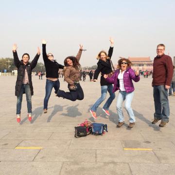 This is me with the EF staff at Tienanmen Square (you can see the Forbidden city in the background). I was not told that I was supposed to flail my arms about - now I look silly jumping, and I look silly for not looking silly enough.